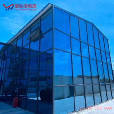 China Modern Prefab House Low Price Light Steel Frame Sandwich Panel Houses Modern Hotel Standard Or Customized 20 Years Anti 100km/h for sale