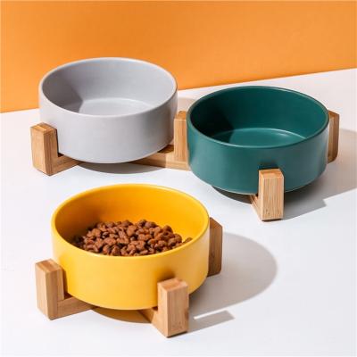 China Sustainable Premium Luxury Slanted Ceramic Pet Bowl With Bamboo Stand for sale