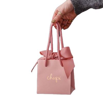 China Eco Gift Bag Clothing Bag Black Card Paper Brown Card Paper Printed LOGO Printed Business Advertising Handbag for sale