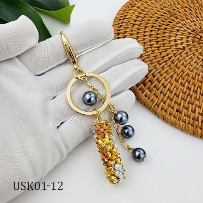 China Hawaii plumeria flower two tones color bead key chain verious Hawaii jewelry souvenir gifts promotion fast delivery for sale