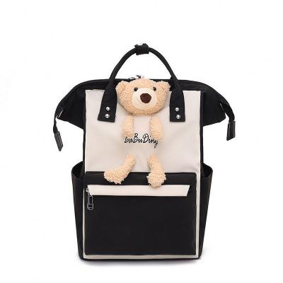 China With Handle Good Quality Nylon Leisure Cartoon Bear Doll Diaper Gift School Backpack With Portable Handle for sale