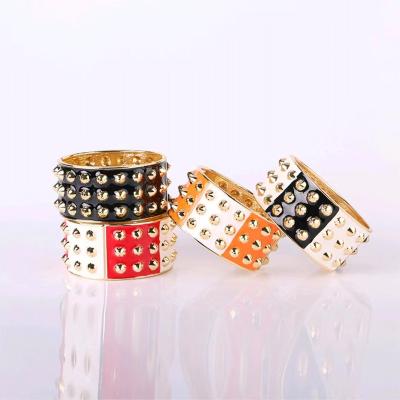 China Unique European Punk Exaggerated 3.5cm Width Enamel Rivet Design Gold Plated Alloy Bracelet 3 Colors Available for sale