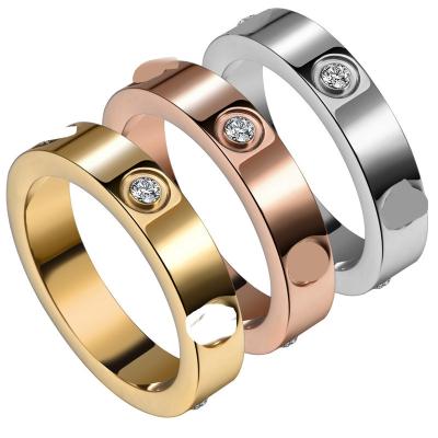 China CLASSIC Simple Zircon Design Stainless Steel Gold Plated Rings Couple Designer Ring For Lovers 3 Colors for sale