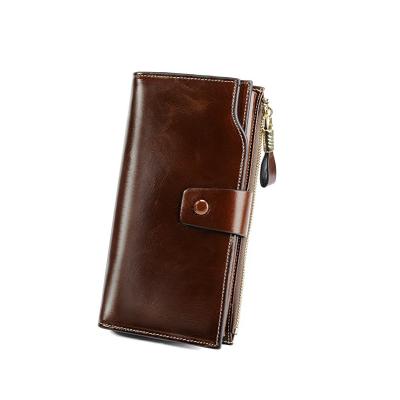 China Waterproof Women's RFID Blocking Wallet Large Capacity Wristband Clutch Card Organizer Wallet For Women for sale