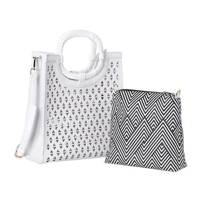 China New large capacity fashion hollow ladies handbags, single-shoulder messenger large capacity handbags for sale