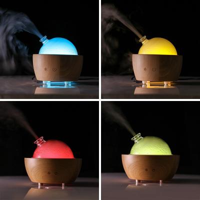 China Portable Electric Essential Oil Diffuser Car USB Ultrasonic Air Humidifier for Car Wood Grain LED Lights Diffuser for Home for sale