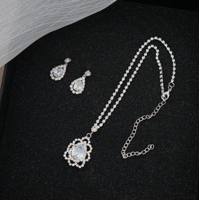 China QIFEI Wholesale Wedding Necklace Earring TRENDY Set Flower Zircon Pendant Necklace Bridal Wedding Jewelry Set for sale