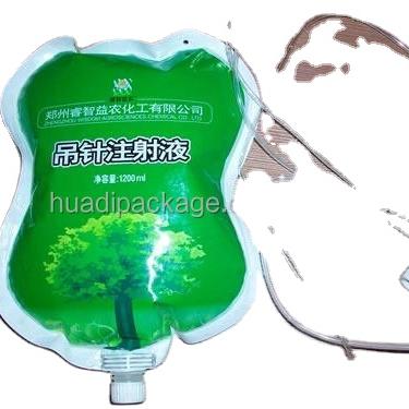 China Custom Tree Size Logo 1000ml Potted Plant Infusion Spout Pouch With Rubber Tube For Tree Nutrient Solution Packaging for sale