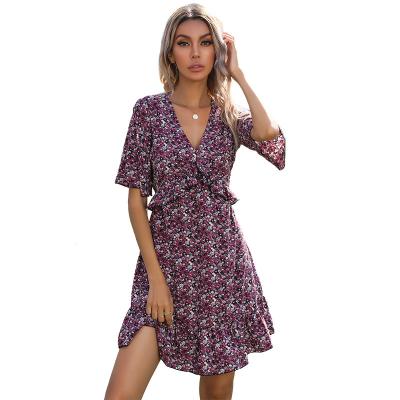 China Anti-wrinkle 2021 women's short-sleeved backless ruffle dress new french casual floral v-neck summer dress for sale