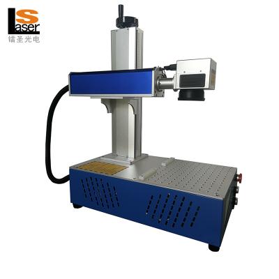 China Laser Marking Portable Type Fiber Laser Marking Machine On Metal Jewelry Arabic Script for sale