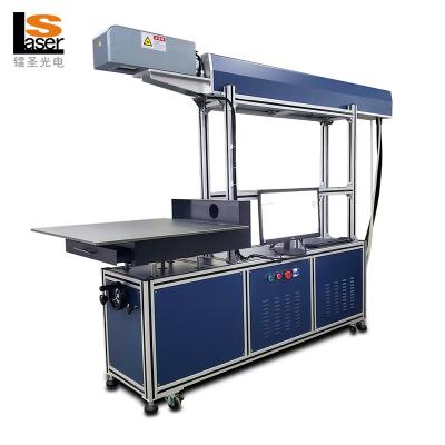 China Laser Marking Large Workplace Radio Frequency CO2 Metal Tube Laser Engraving Marking Machine For Washing Jeans for sale