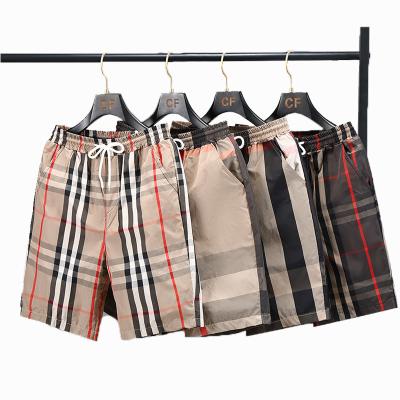 China Anti-wrinkle 2022 summer fashion luxury striped plaid shorts men's casual European and American designer Print Men's shorts wholesale for sale