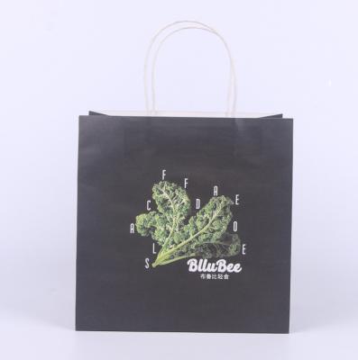 China CMYK Printing Wide Base Paper Carrier Bags for sale