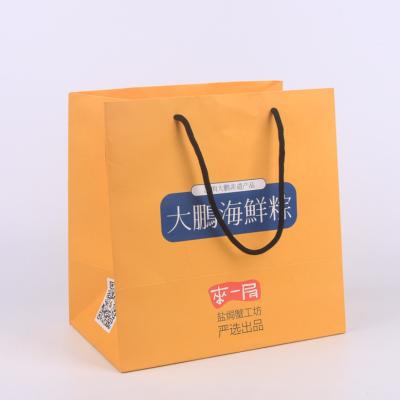 China ROHS 300gsm Kraft Paper Shopping Bags ODM Eco Paper Bag for sale