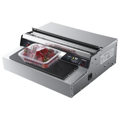 China Professional Food Maker Semi - Automatic Hand Wrapping Plastic Cling Film Machine for sale