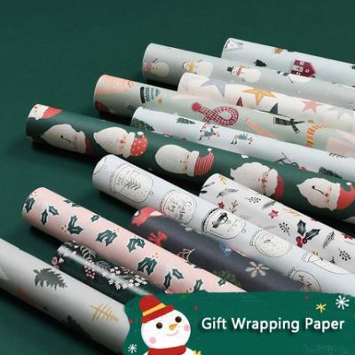 China 2021 Christmas Wrapping Paper Disposable Gift Wrap Santa Snowman Background Vintage Wrapping Papers for sale