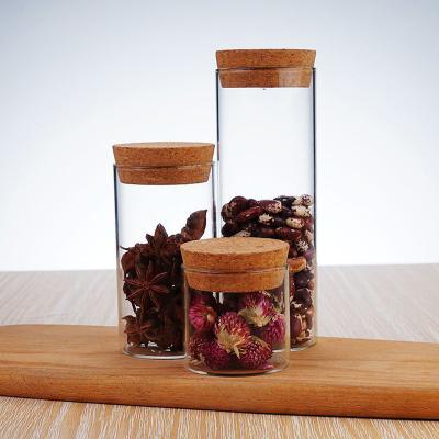 China Multifunctional Wholesale Different Sizes Borosilicate Glass Jars Kitchen Sealed Glass Sealed Storage Jars With Cork Lid for sale