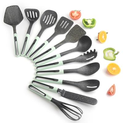 China Sustainable Kitchen 11-Piece Silicone Cookware Set Nonstick Cookware With Beater for sale