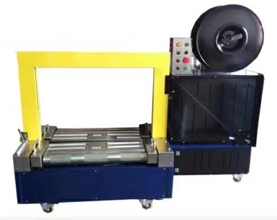 China Fully electric low deck automatic food strapping machine pp band together packing machine for box carton packing for sale