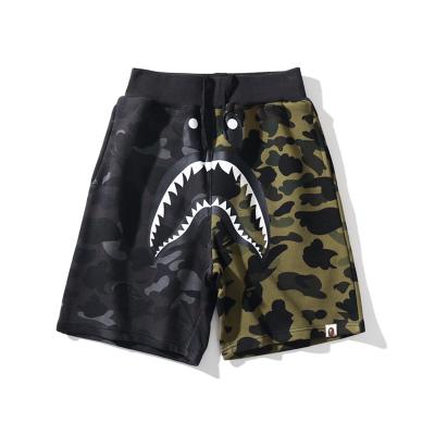 China Anti-wrinkle shark monkey main man department dark black and green hip hop casual pants men and women street patchwork camouflage shorts for sale