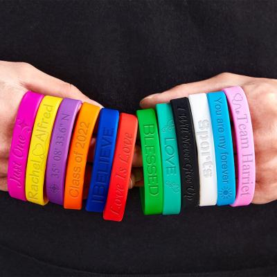 China Double Sided Custom Silicone Wristbands Wristbands Silicone Rubber Wristbands With Motivational Events for sale