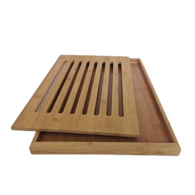 China Sustainable Bamboo Material Food Grade Kitchen Tools Kit Bread Cutting And Bread Board Serving Tray for sale