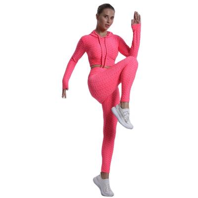 China Chemical fiber blending European and American yoga clothes bubble hooded sports yoga high waist high waist jacket long sleeve suit. for sale