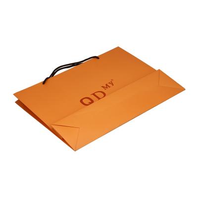 China Moisture Proof Custom Design Kraft Paper Bags Printing For Clothes Packing for sale