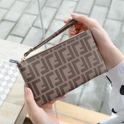 China Anti-theft lady with purse girl style personality zipper large capacity multi-card wallet for sale