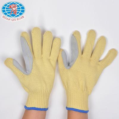 China Anti-slip top product 7G aramid fiber glove with cow split leather sewn between thumb and forefinger for sale