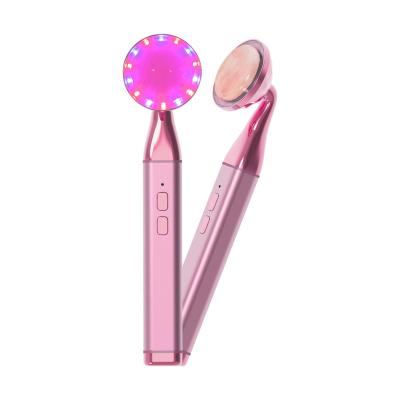 China USB Rechargeable Rose Quartz Heating Electric Vibration Facial Roller Anti Aging Natural Facial Massager With Light for sale