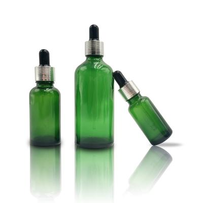 China Wholesale 5ml 20ml 50ml 100ml Empty Green Glass Environmental Friendly Rose Essential Oil Bottle With Dropper for sale