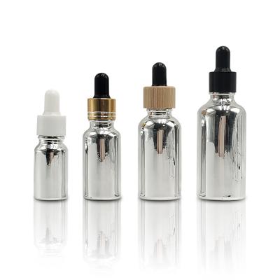 China New 5ml 10ml 20ml 30ml Cosmetic Skin Care Serum Essential Oil Glass Bottle With Eye Dropper for sale