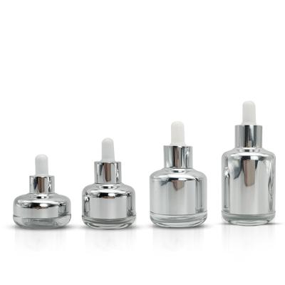 China Wholesale 20ml 35ml 50ml 55ml 50ml Cosmetic Empty Silver Color Essential Oil Dropper Glass Bottle for sale