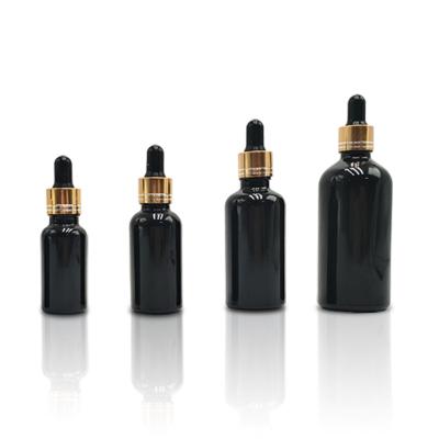 China Wholesale 10ml 15ml 30ml 50ml 100ml Cosmetic Black Glass Dropper Bottles Essential Oil Bottle for sale