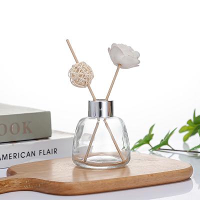 China 50ML Cosmetic Wholesale Hot Stamping Empty 100ML 150ML Round Reed Diffuser Bottle With Cap for sale