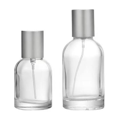 China Environmental Friendly 30ml 50ml 100ml Custom White Empty Round High Perfume Oil Bottles With Body Spray for sale