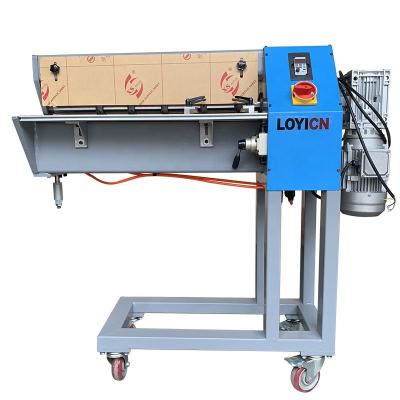 China The machine adopt open design LOYICN inventory conveyor belt cutting slitting machine size 600 mm 3PH- 380V with extra blades for sale