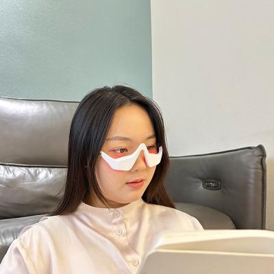 China Rechargeable Eye Care Massage Device with 3D Vibration and LED Red Light Therapy for sale