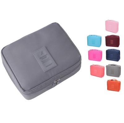 China Portable Oxyford Cloth Multifunctional Waterproof Travel Makeup Toiletry Pouch Casual Wash Cosmetic Case for sale