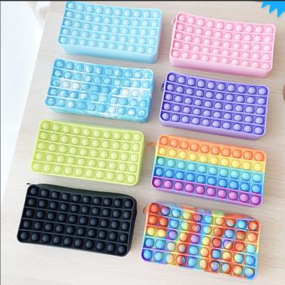 China AA22-24 Silicone Rectangle Silicone Pencil Case Push Bubble Busy Person Toys Student Pens Bags Coin Purse Stationery Box Kids Toys for sale