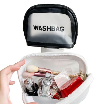 China Portable Waterproof Wash Bag Ons Waterproof Clear Black Glitter Bag Toiletry Bag Toiletry Printed Cosmetics Storage Bag for sale