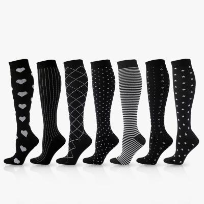 China Breathable compression thongs European and American socks male and female outdoor sports thongs compression stockings series tube socks for sale