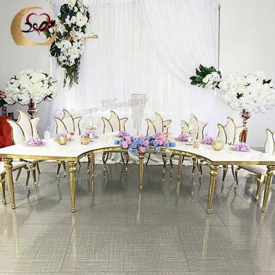 China Modern Luxury Stainless Steel Half Moon Leg MDF Dining Table Set 10 Seater for sale