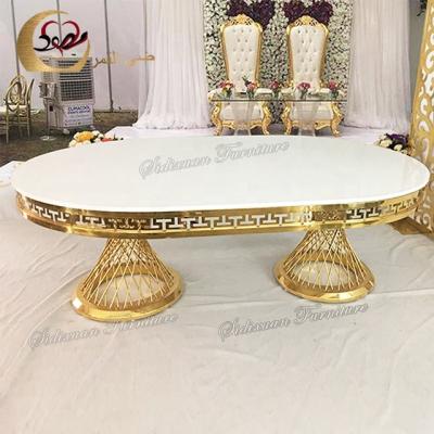 China Modern Luxury Stainless Steel Base Gold Shape MDF Oval Wedding Dining Table for sale