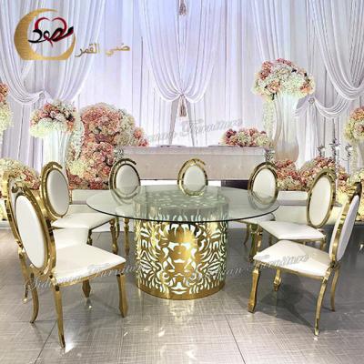 China LED Light Round Stainless Steel Glass Top Dining Table Party Led Table for sale