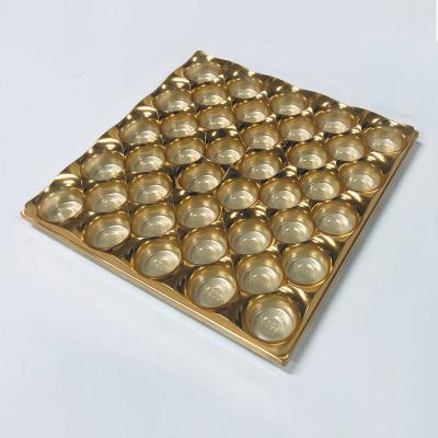 Cina OEM ODM Food Grade PET Gold Coating Blister Tray Scatole di plastica per imballaggi di dolci in vendita