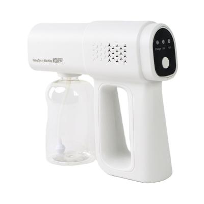 China Radio Blue Light Sterilizer Atomization Spray Gun Nano Good Quality Held Paint Disinfection K5 Electric Blue Light Sprayer for sale