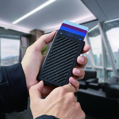 China Pop UP Minimalist Automatic Pop Up RFID Blocking Custom ID Credit Carbon Fiber Card Holder Laser Metal Card Case for sale