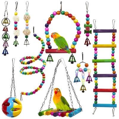 China 10 Pack Viable Bird Cage Toys For Reliable Parrots And Chewable Swing Chew Bite Bridge Hanging Beads Wooden Ball Bell Toys Bird Toys Set for sale